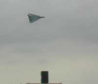 Tomcat, ears back, and burnin' Tomcat, ears back, and burnin'