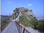 The bridge/donkeypath/scooter highway to Civita.